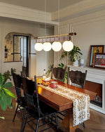 Sinuara Ribbon Globe Linear Chandelier