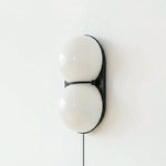 Two Globe Glass Plug-in Wall Sconce
