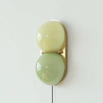 Two Globe Glass Plug-in Wall Sconce